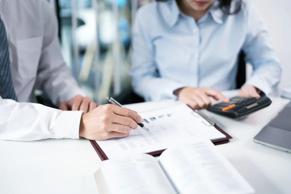 entrepreneurs reviewing data to validate business ideas